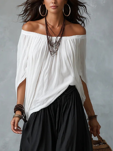 Mara | Tweedelige Set met Witte Off-Shoulder Blouse en Zwarte Palazzo Broek