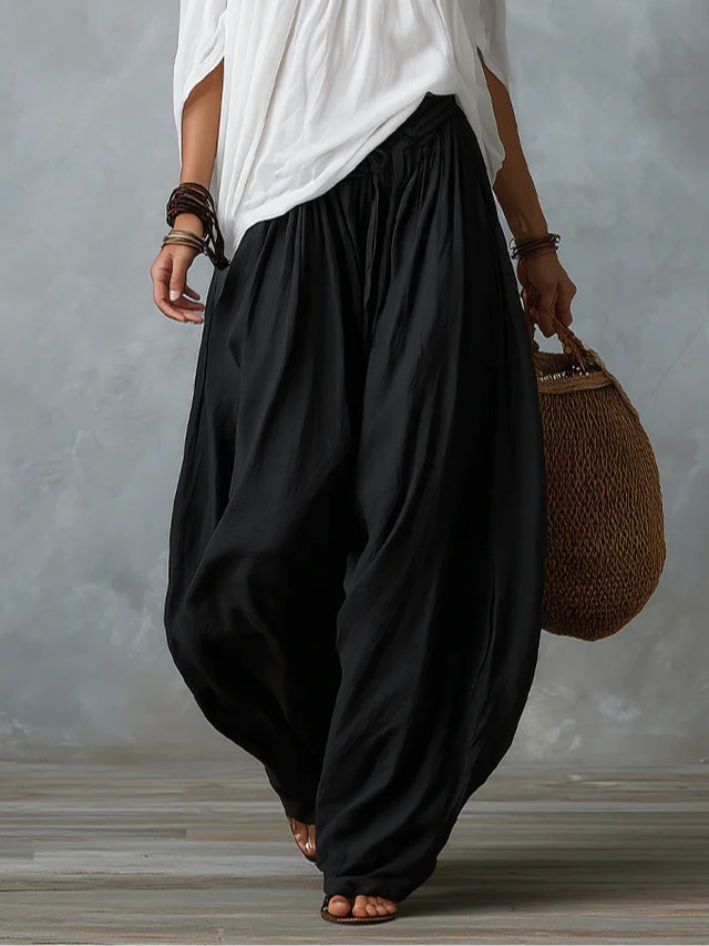 Mara | Tweedelige Set met Witte Off-Shoulder Blouse en Zwarte Palazzo Broek