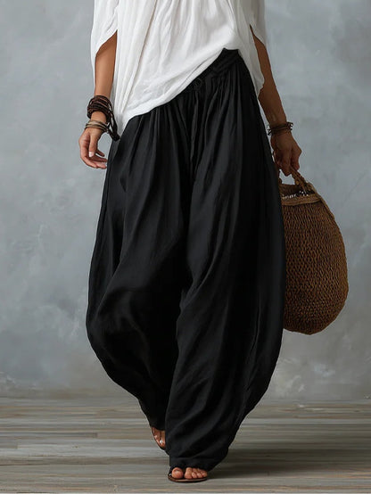 Mara | Tweedelige Set met Witte Off-Shoulder Blouse en Zwarte Palazzo Broek