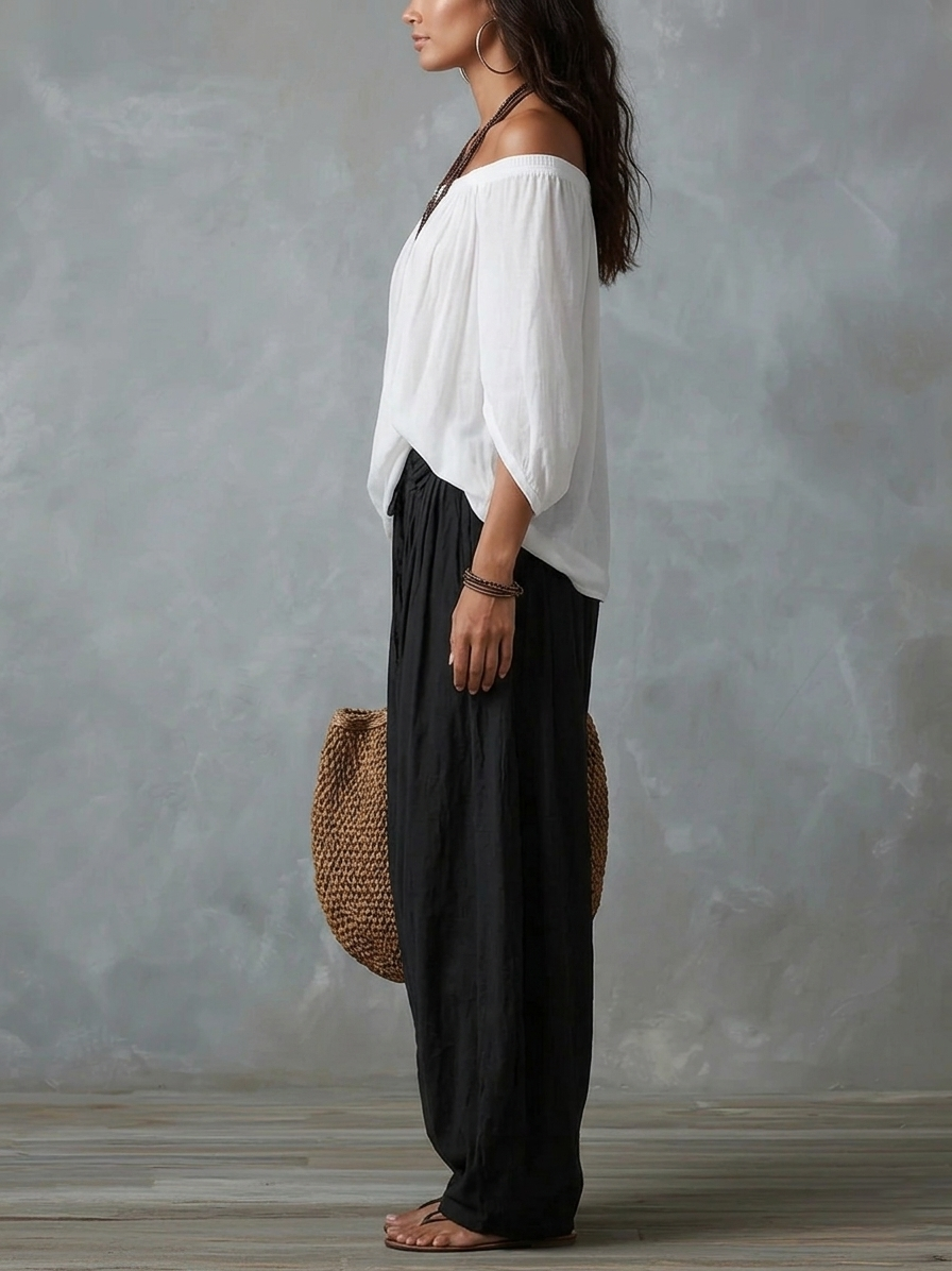 Mara | Tweedelige Set met Witte Off-Shoulder Blouse en Zwarte Palazzo Broek